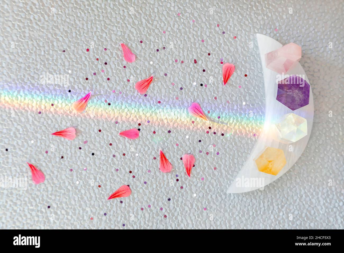 Various crystals and flower petals Stock Photo
