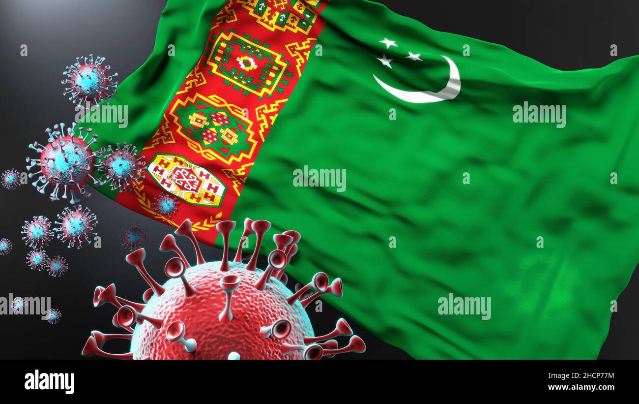 Turkmenistan and the covid pandemic - corona virus attacking national flag of Turkmenistan to symbolize the fight, struggle and the virus presence in Stock Photo