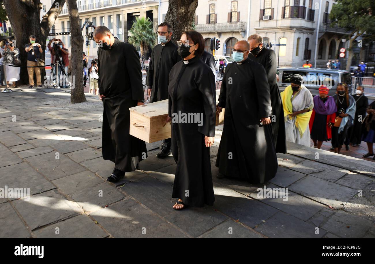 The casket containing the body of Archbishop Desmond Tutu arrives at St. Georges Cathedral for his lying in state in Cape Town, South Africa, December 31, 2021. REUTERS/Mike Hutchings Stock Photo