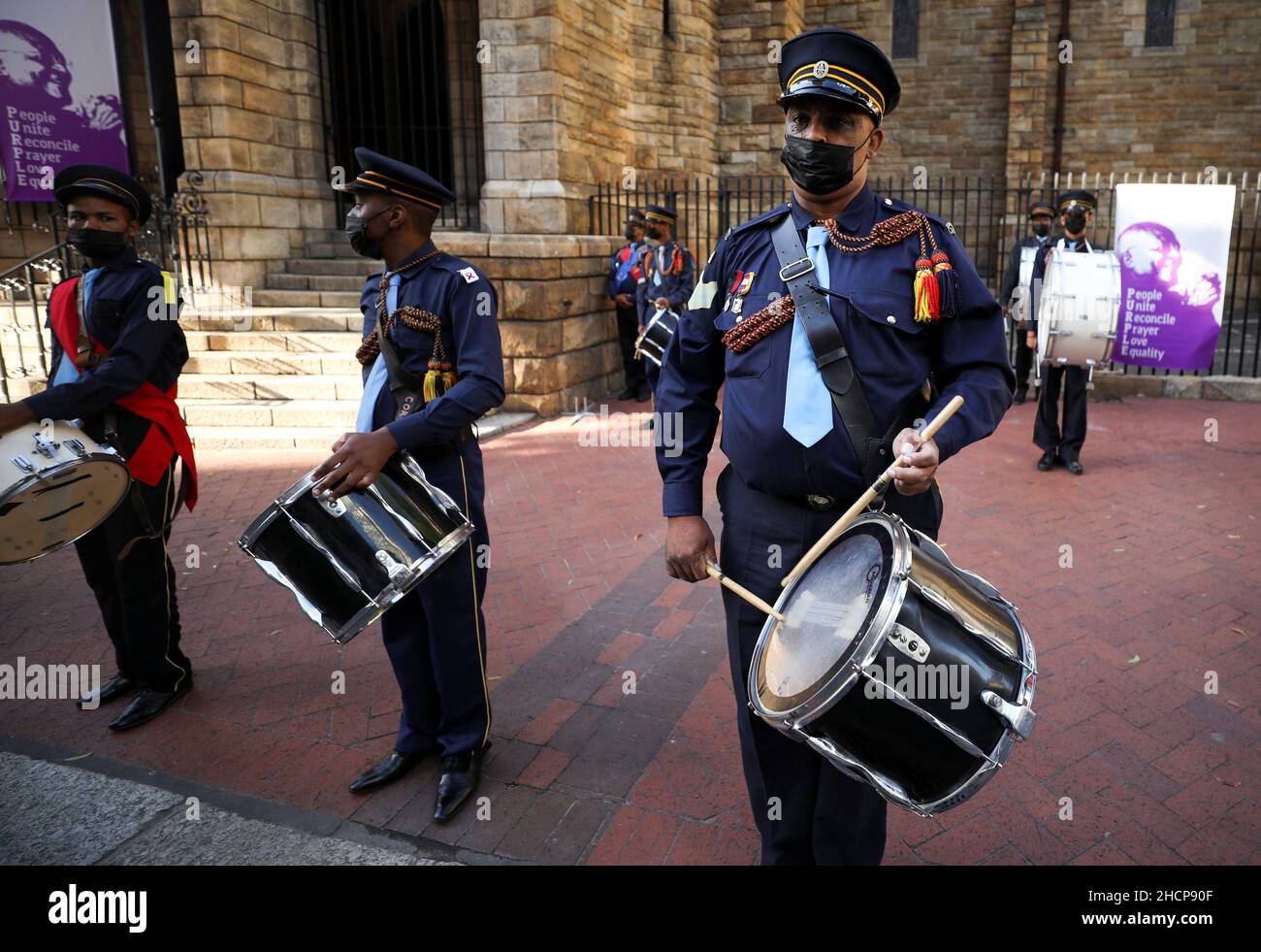 A church band plays outside the cathedral ahead of the arrival of the coffin of Archbishop Desmond Tutu at St. Georges Cathedral for his lying in state, in Cape Town, South Africa, December 31, 2021. REUTERS/Mike Hutchings Stock Photo