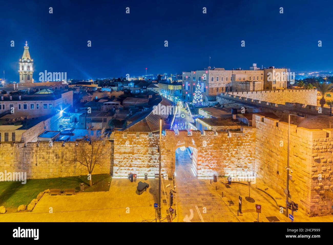 View of the new gate in the old city walls, with Christmas tree and Christmas lights. Jerusalem, Israel Stock Photo