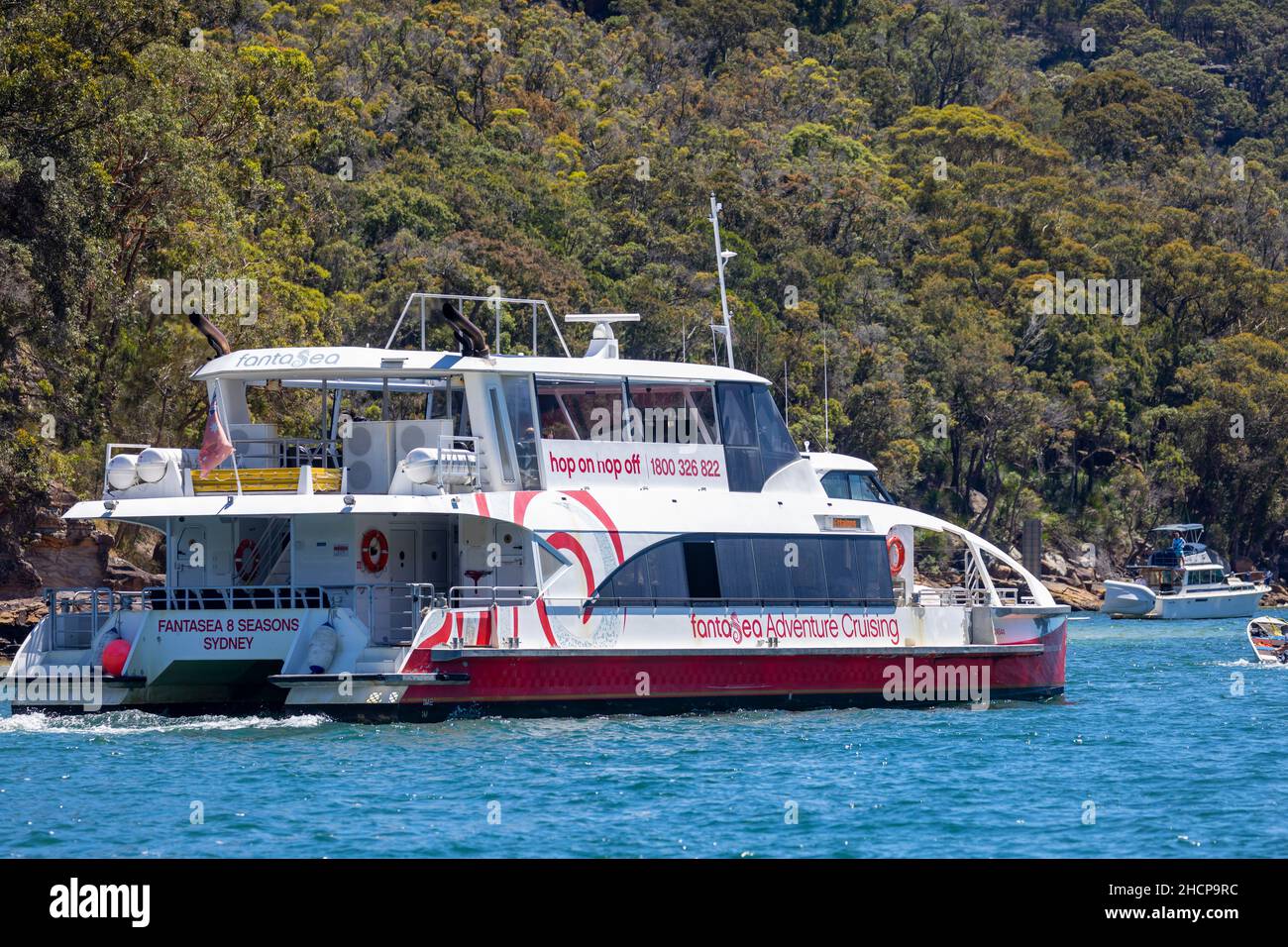 Fantasea Ferry boat on Pittwater departs Palm Beach ferry wharf on route to Wagstaffe and Ettalong on the Central Coast, Sydney, NSW, Australia Stock Photo