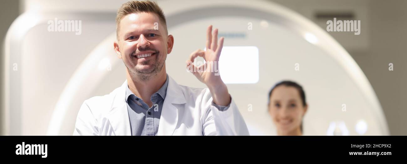 Doctor and patient perform CT, MRI or PET medical examination in laboratory of modern hospital Stock Photo