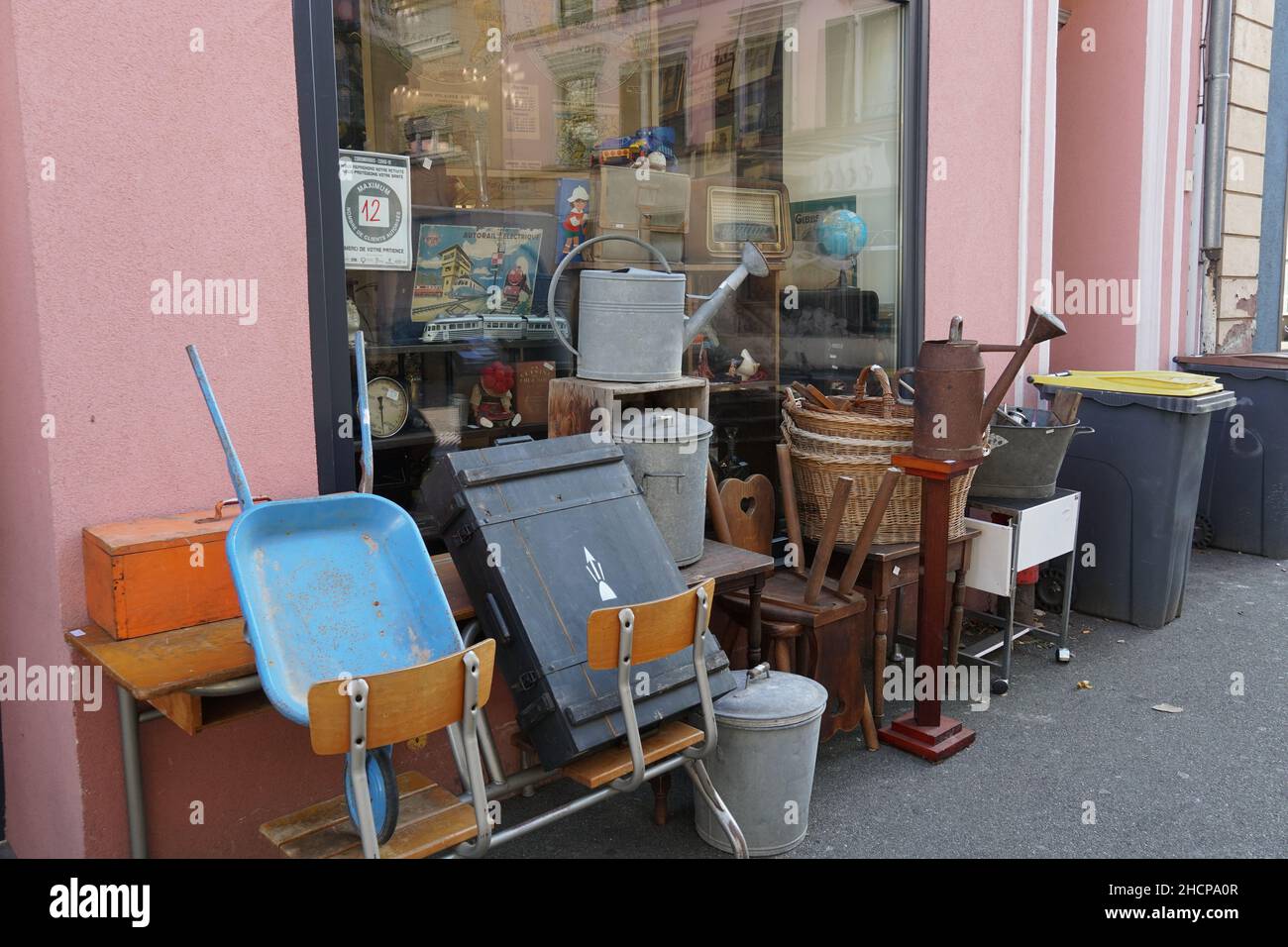 Secondhand store called brocante in French with vintage goods exhibited