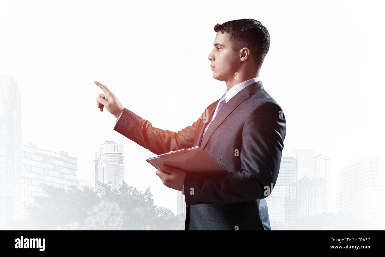 Side view of man in business suit and tie Stock Photo - Alamy