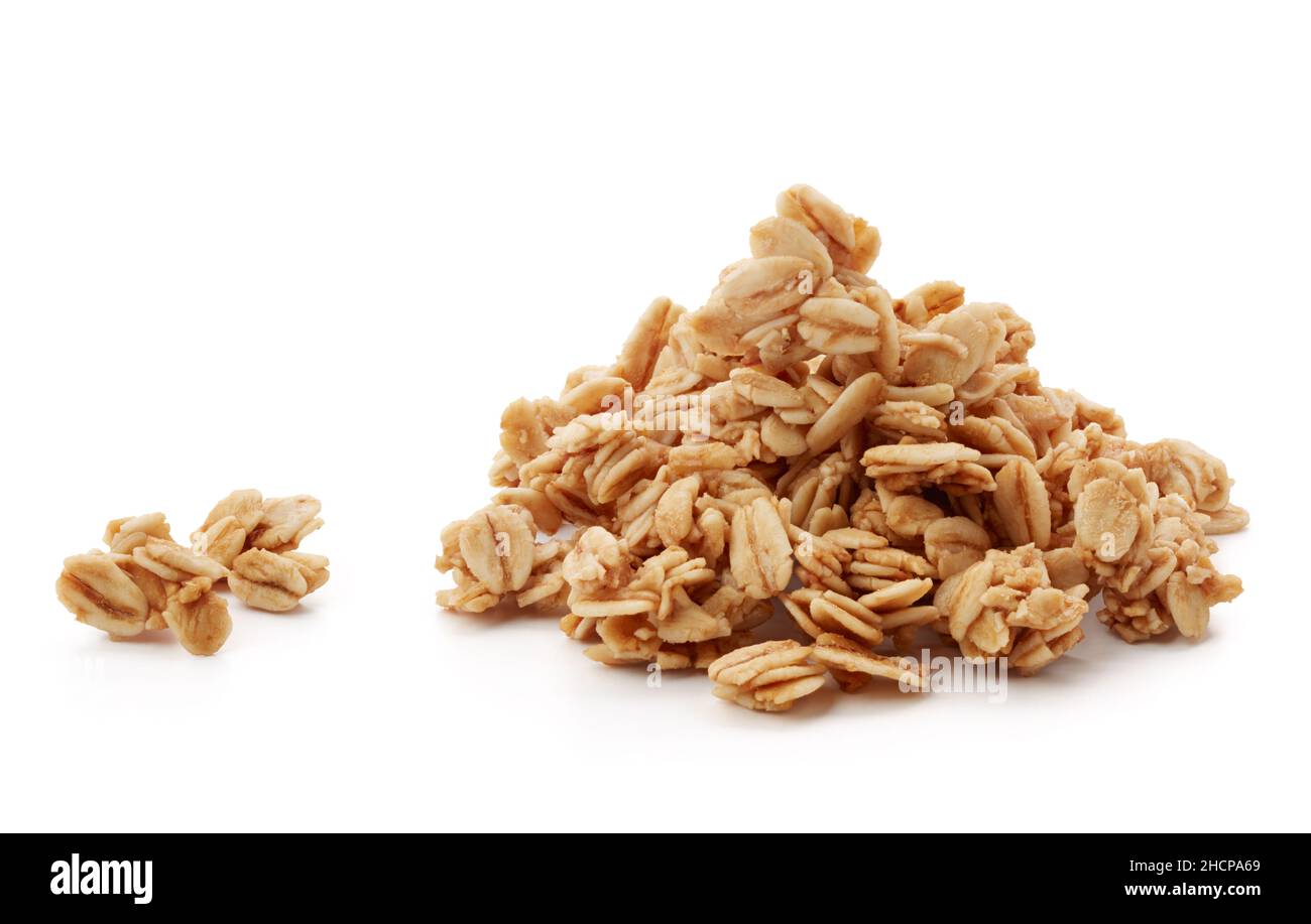 heap of granola isolated on white background Stock Photo