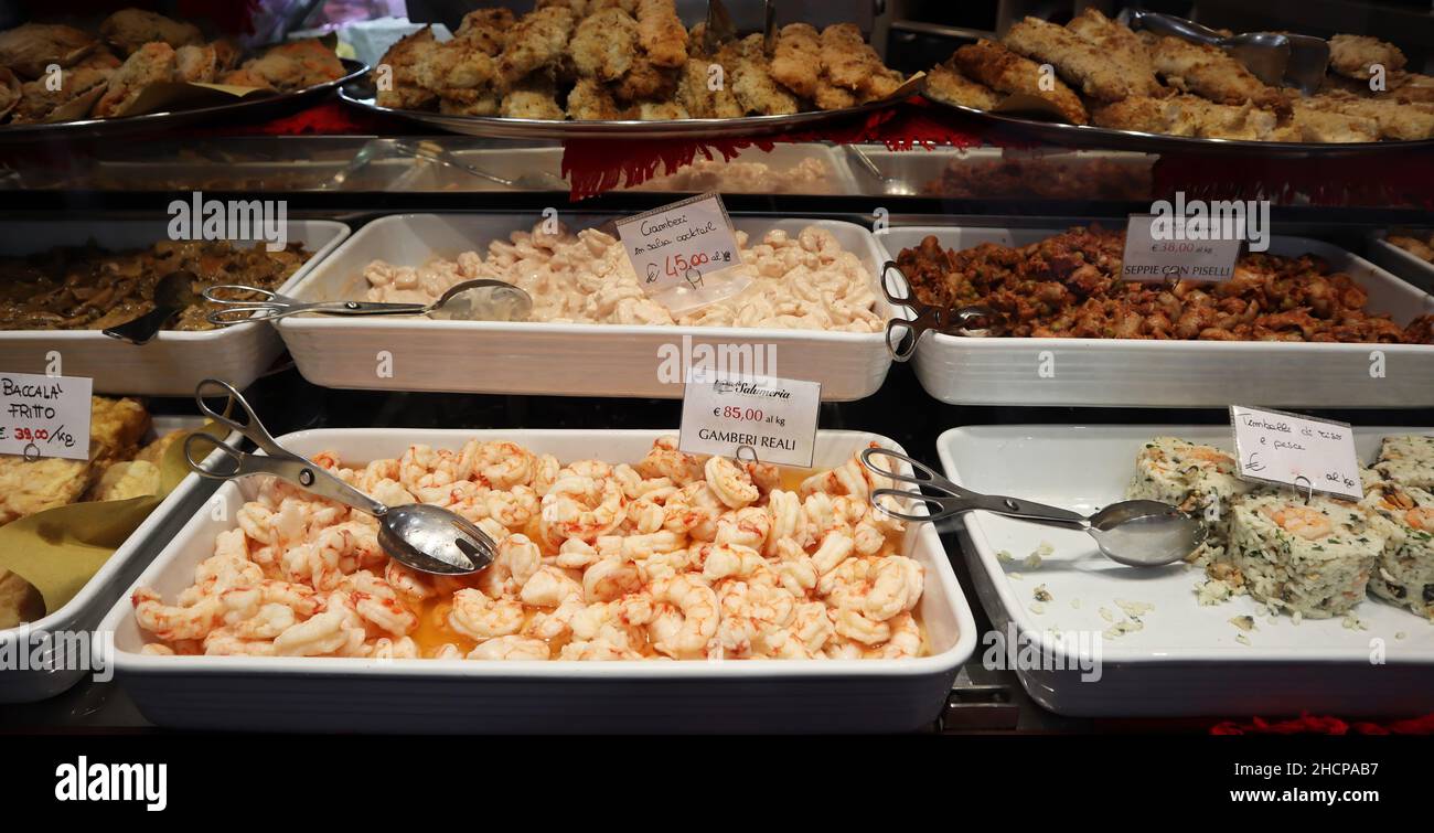 Shop window of traditional Christmas food in Bologna. Delicatessen Italian food store Stock