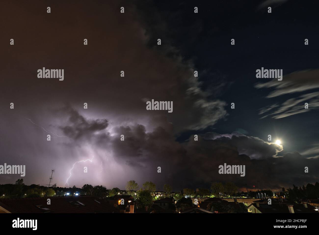 Lightning strikes during a thunderstorm Stock Photo