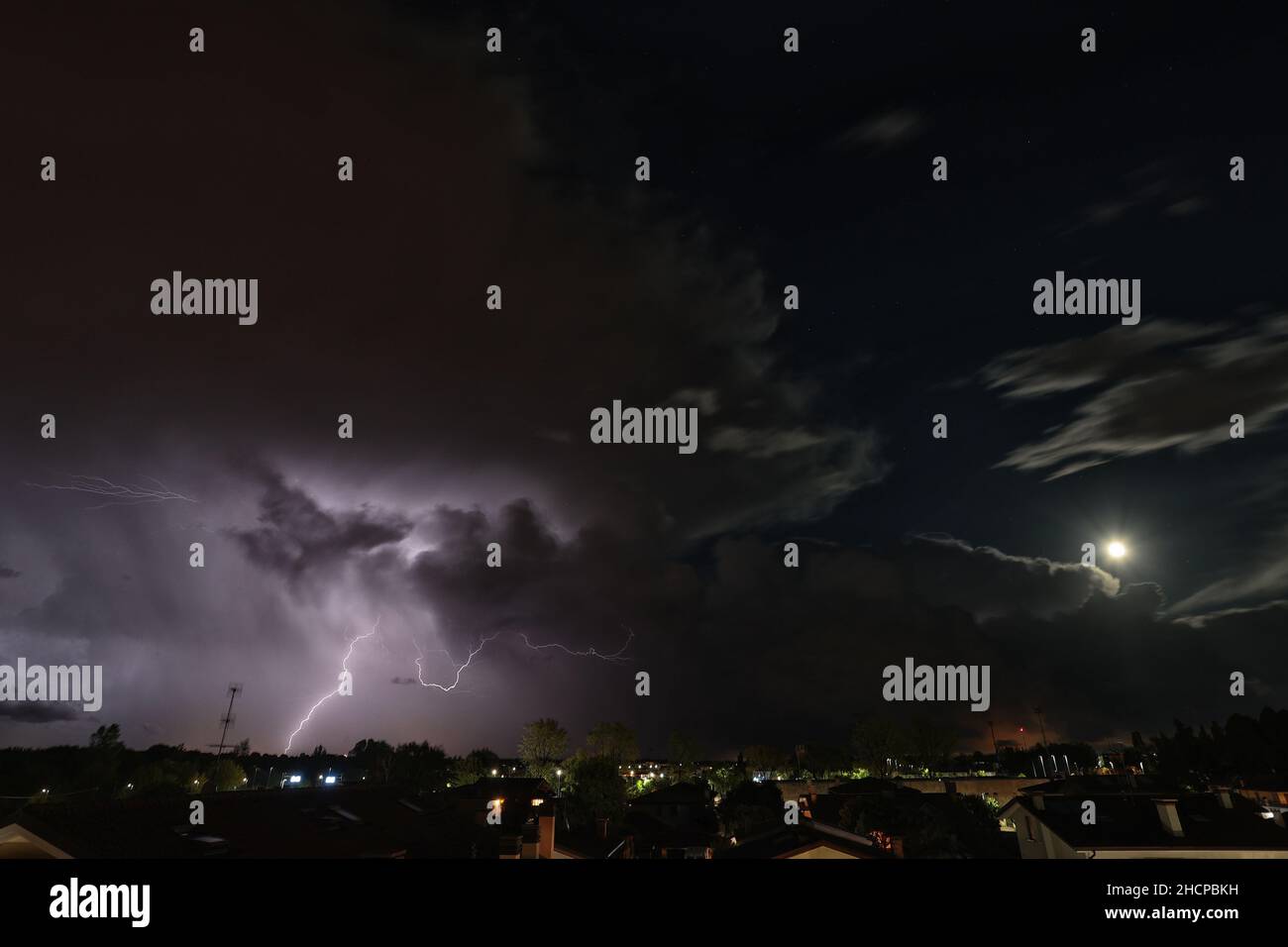 Lightning strikes during a thunderstorm Stock Photo