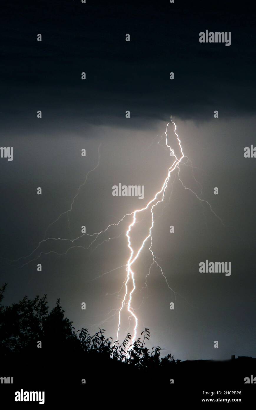 Lightning strikes during a thunderstorm Stock Photo - Alamy