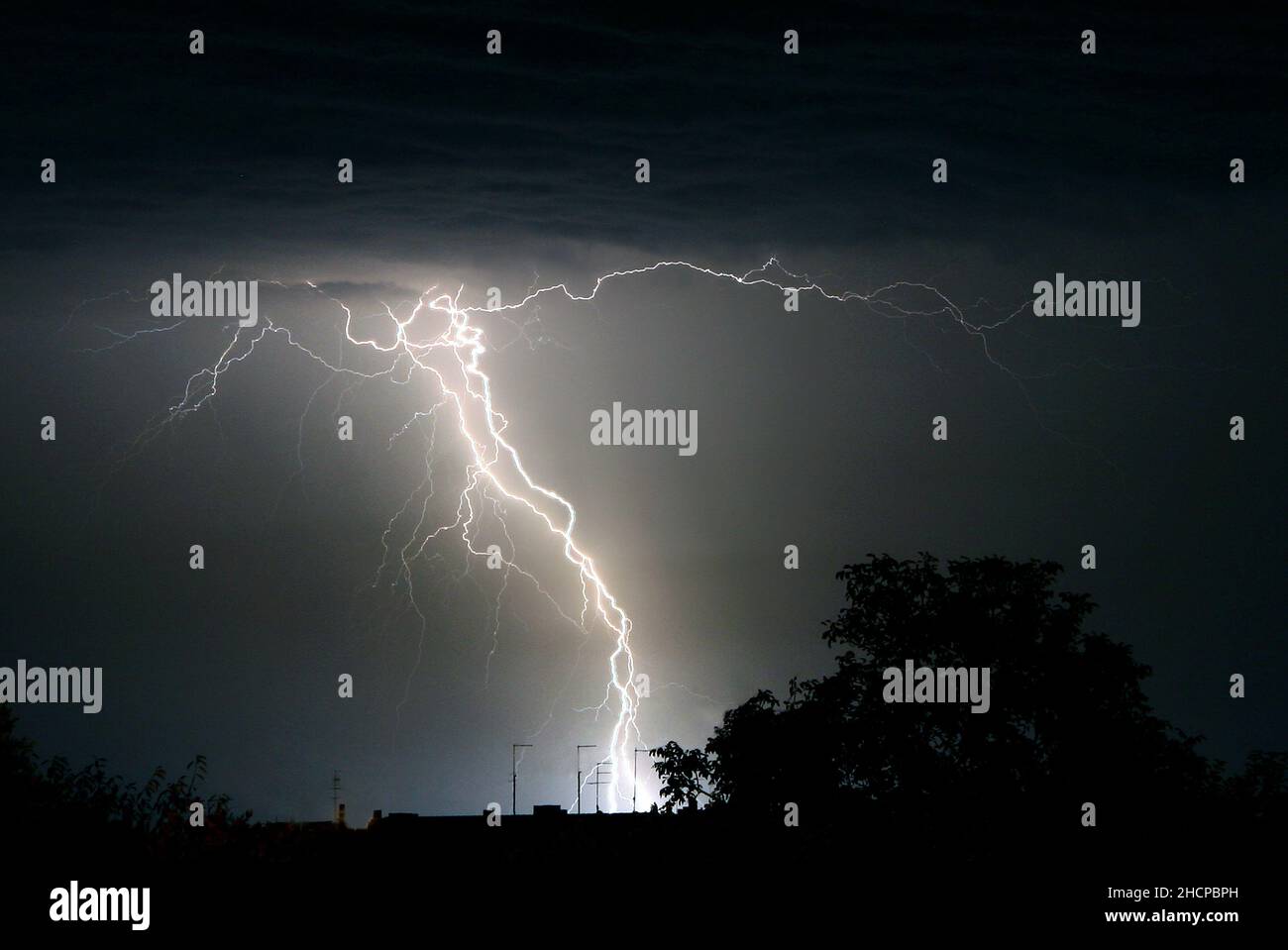 Lightning strikes during a thunderstorm Stock Photo - Alamy