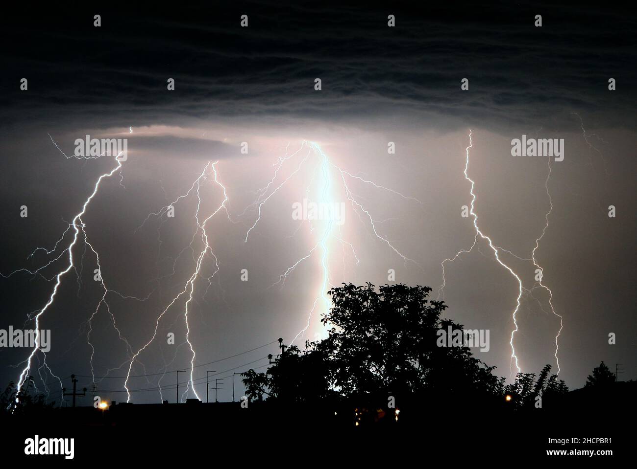 Lightning strikes during a thunderstorm Stock Photo - Alamy