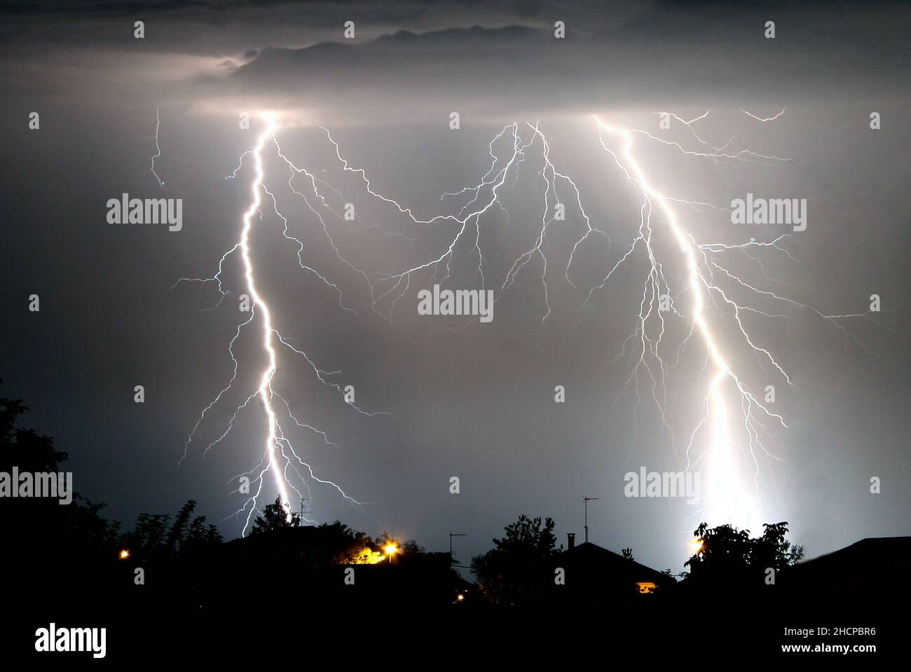 Lightning strikes during a thunderstorm Stock Photo - Alamy