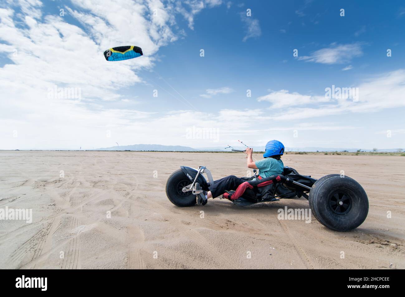 Kite buggy at the beach in sunset. Delta del Ebro Spain Stock Photo - Alamy
