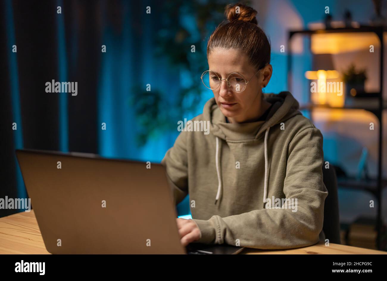 Woman using laptop for work Stock Photo