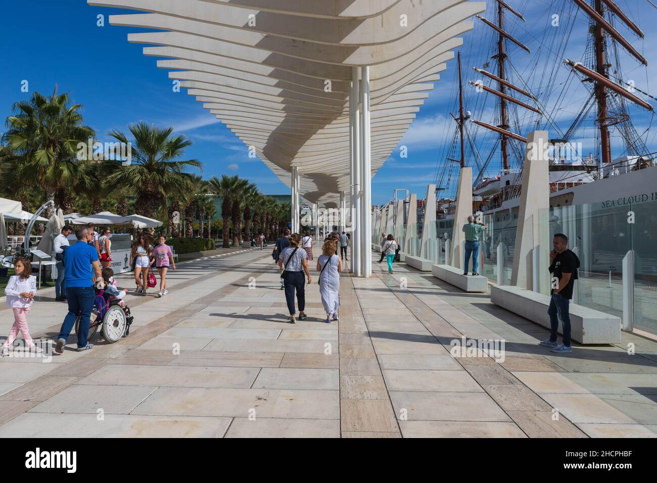 The promenade ( Paseo) del Muelle Uno at the port of Malaga, Spain Stock Photo