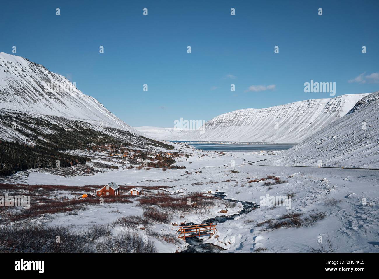 Aerial Drone Panorama view of Westfjords mountains in Icealand. Blue sky in the Westfjords region in Iceland. Nature landscape from above. Stock Photo