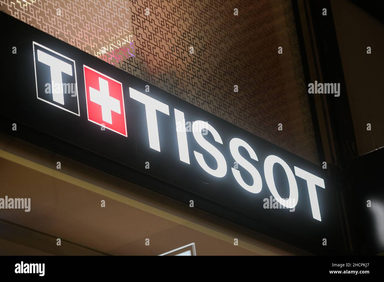 Milan, Italy - September 24, 2021: Tissot logo displayed on a facade of a store in Milan. Stock Photo