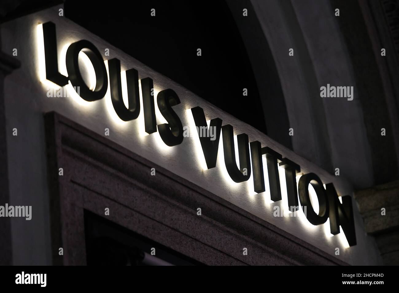Milan, Italy - September 24, 2021: Louis Vuitton logo displayed on a facade of a store in Milan. Stock Photo