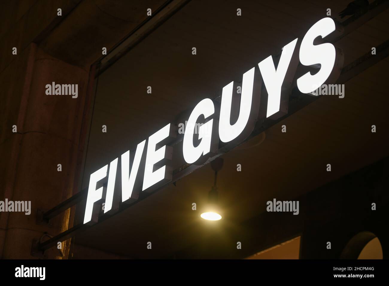 Milan, Italy September 24, 2021 Five Guys logo displayed on a facade