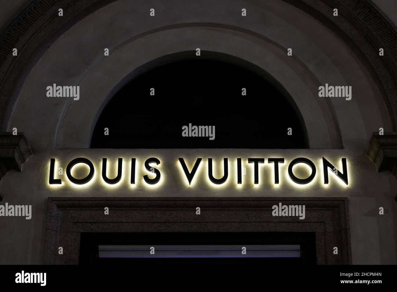 Milan, Italy - September 24, 2021: Louis Vuitton logo displayed on a facade of a store in Milan. Stock Photo