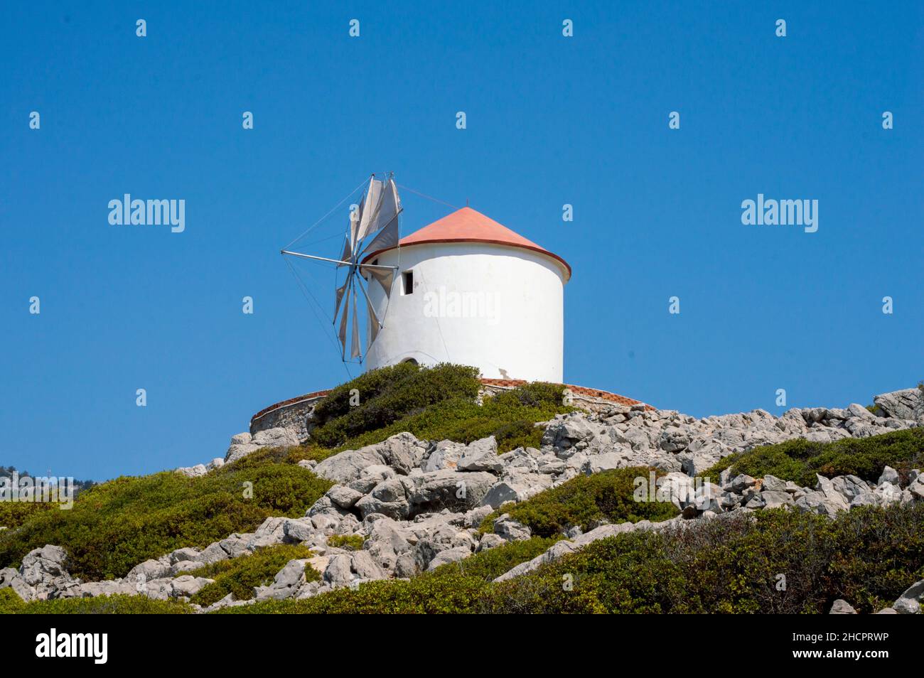 Monastery at Panormitis. Island of Symi Dodecanese. Detail of windmills Islands Aegean Sea. Greece Europe Stock Photo