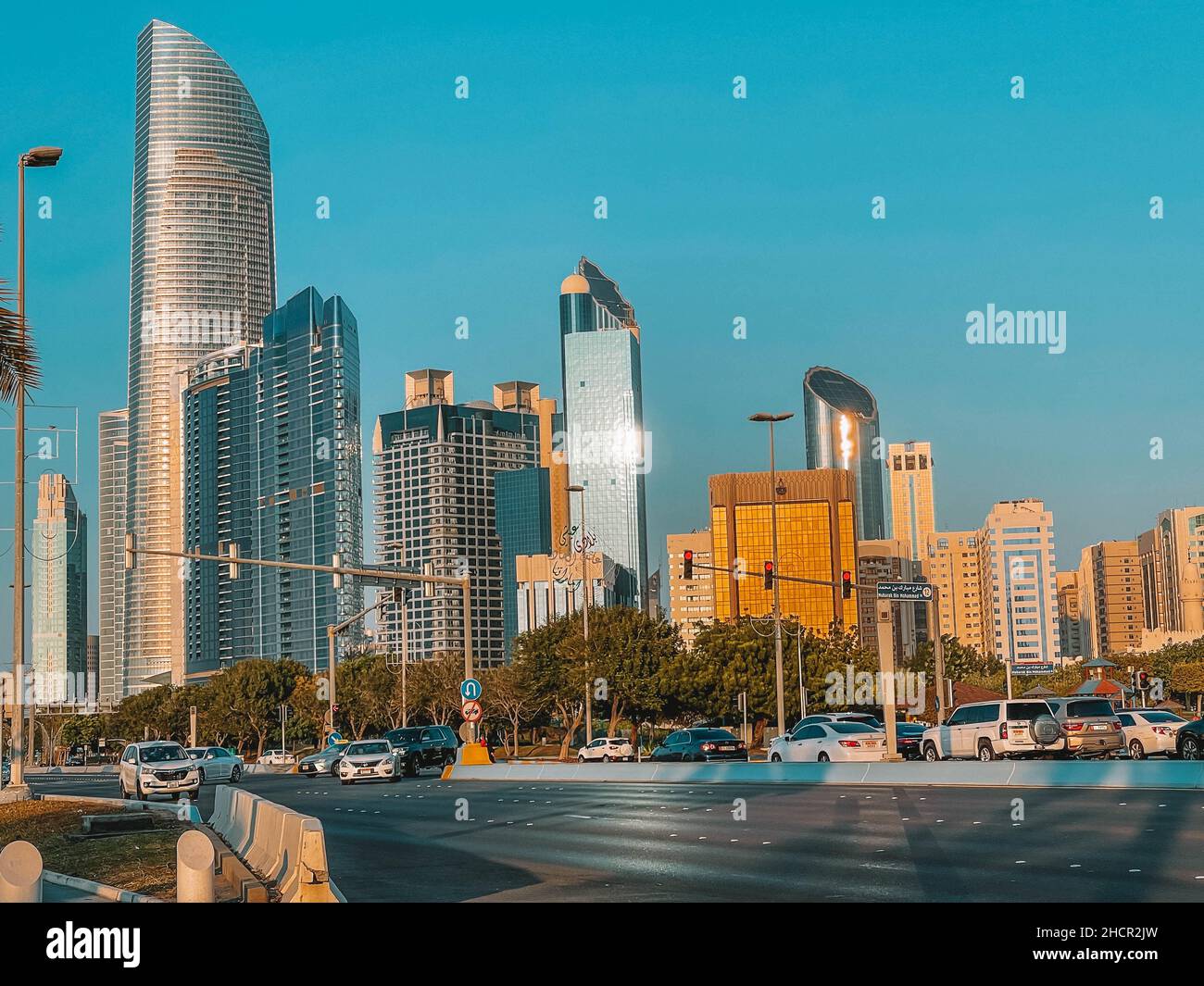 Downtown Abu Dhabi city (UAE) - Abu Dhabi corniche road and beach, landmark towers Stock Photo