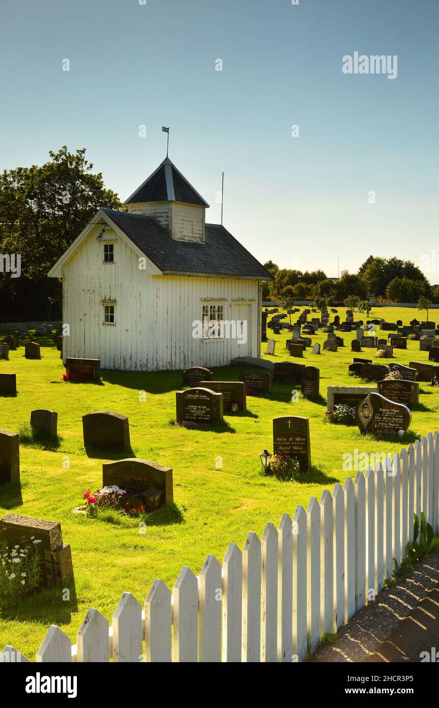 Typical Small White Norwegian Church and Churchyard, Norway Stock Photo