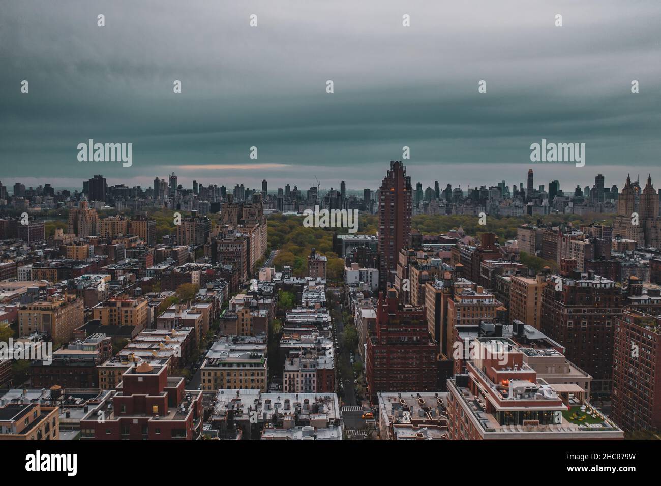 Bird's eye view of the skyscrapers and traffic on a cloudy day in New ...