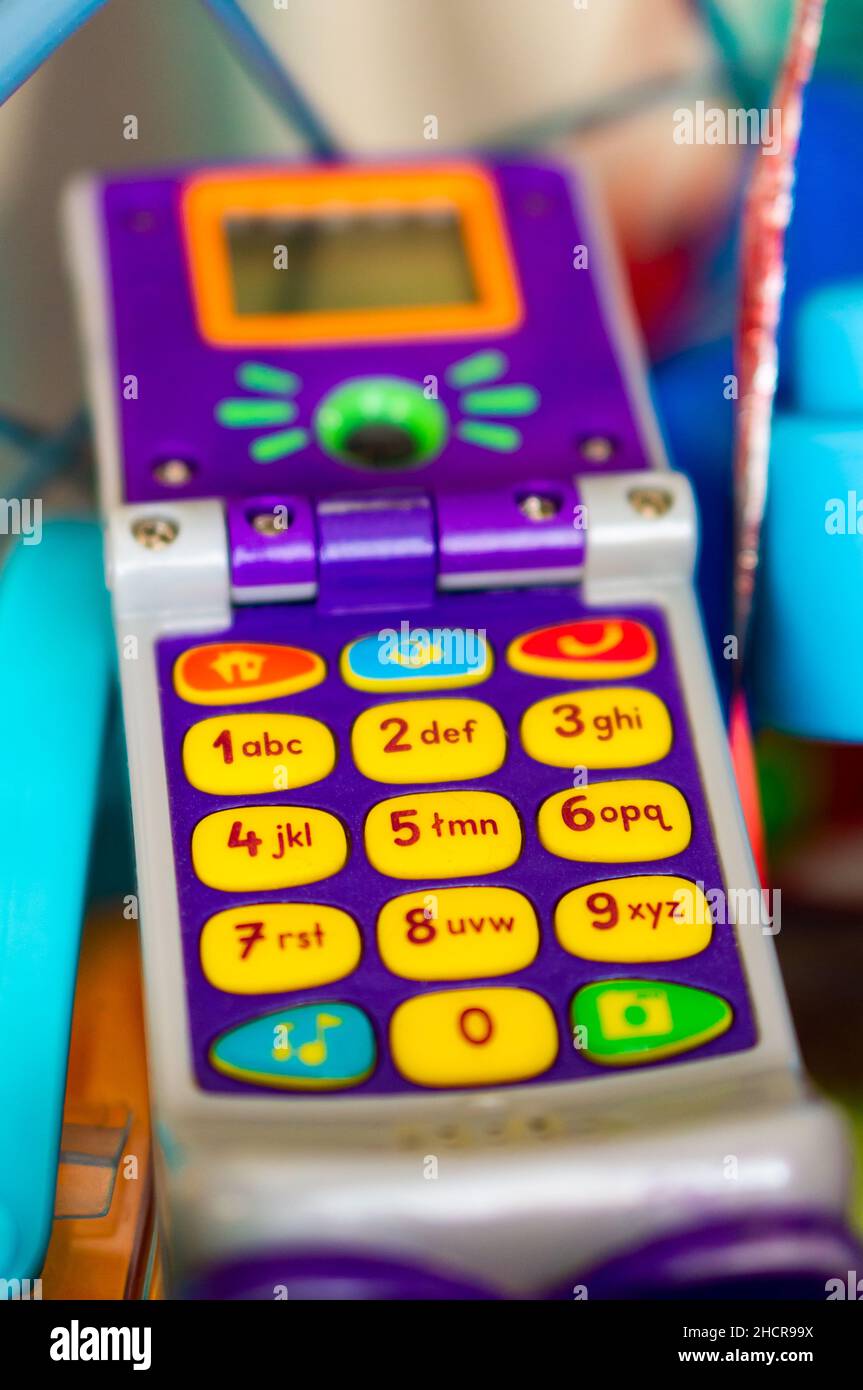 Close up shotr of a Fisher Price brand toy telephone for kids Stock Photo