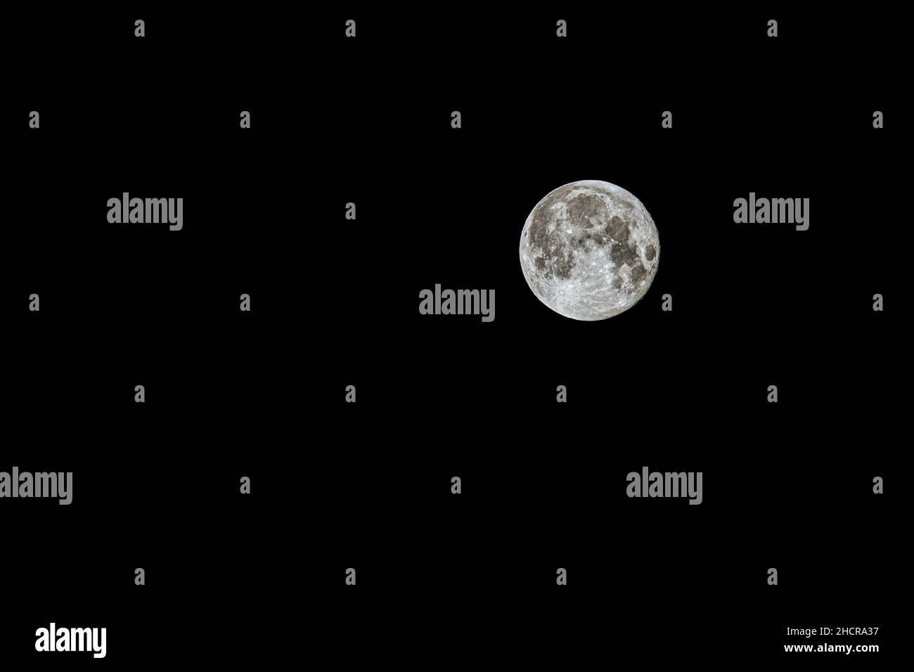 Full moon against a black night sky Stock Photo