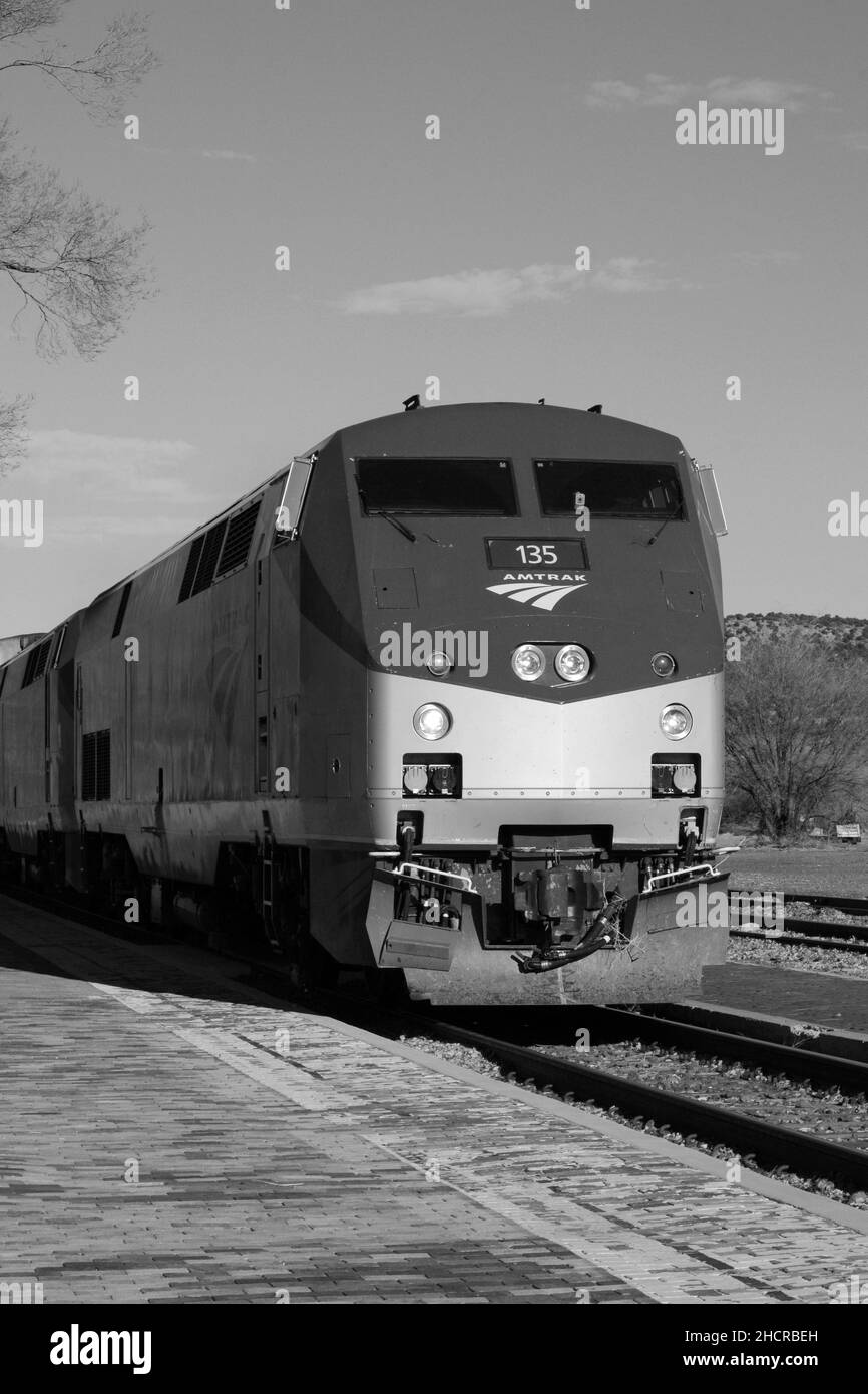 An Amtrak passenger train (the Southwest Chief) arrives at the train station in Lamy, New Mexico. Stock Photo