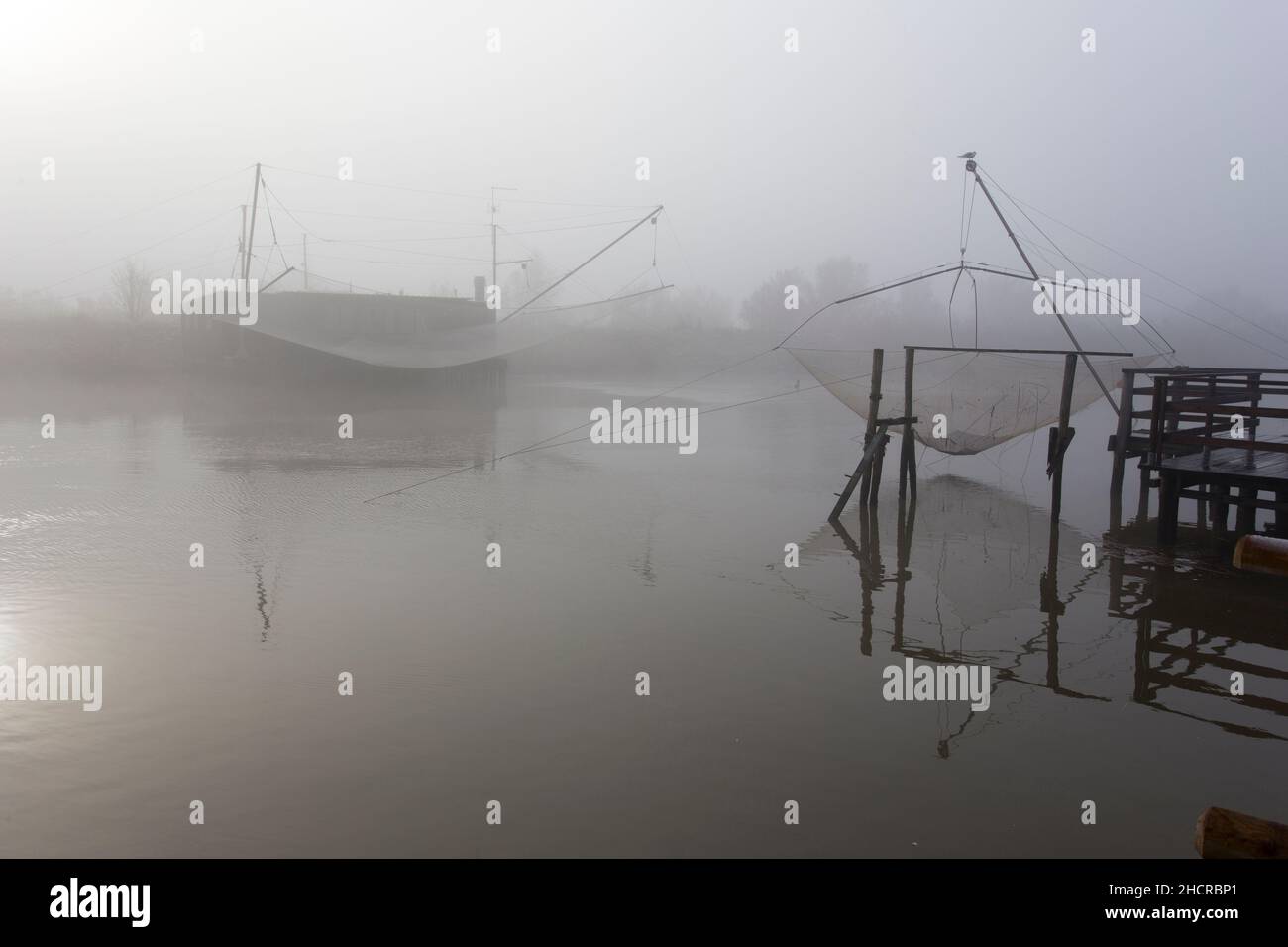 Comacchio, Italy - December 29, 2019: view of fishing house in foggy day Stock Photo