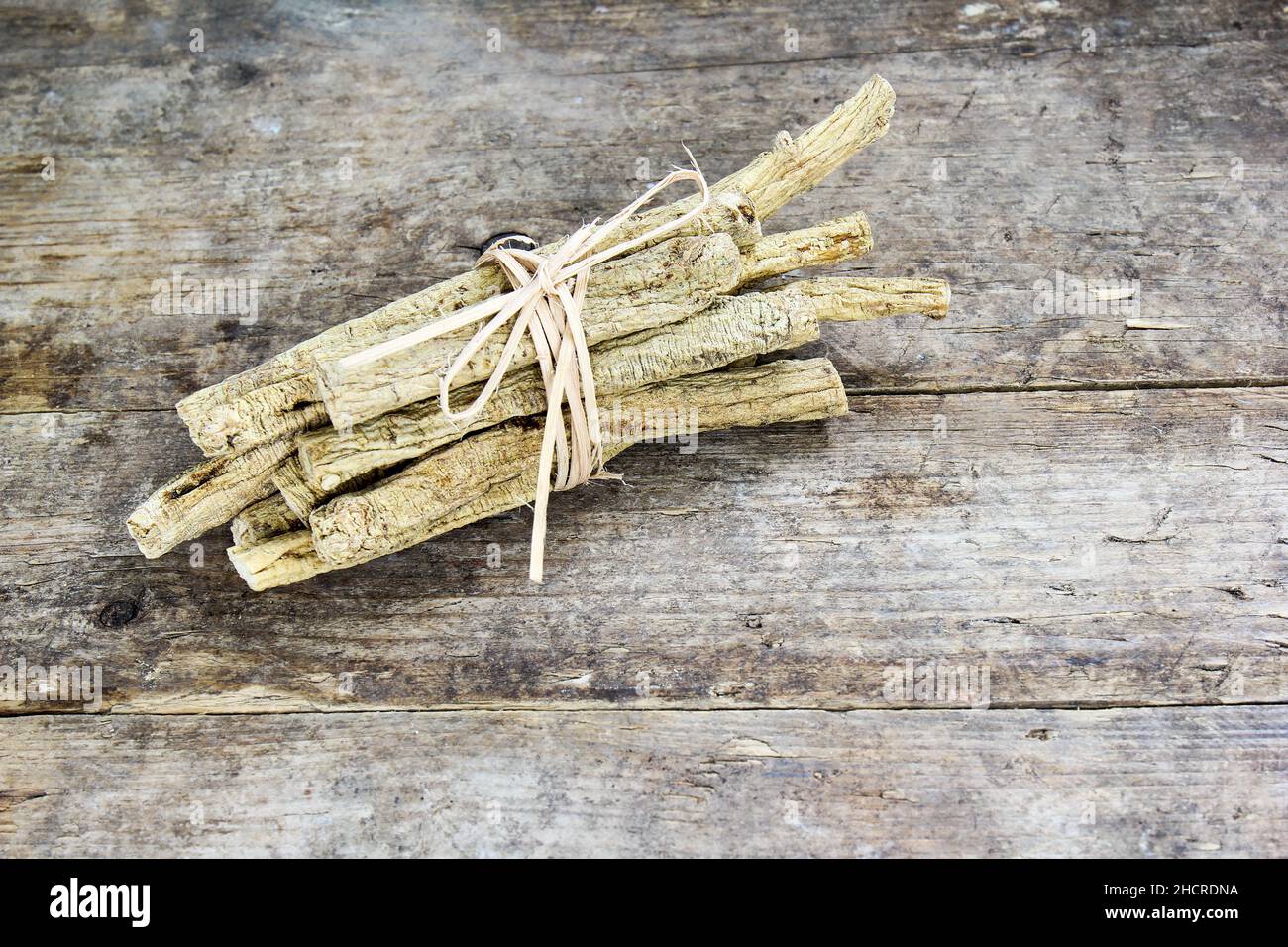 Chinese Herbal medicine - Dang  Shen or poor man's ginseng (Codonopsis pilosula) on grungy wooden background Stock Photo