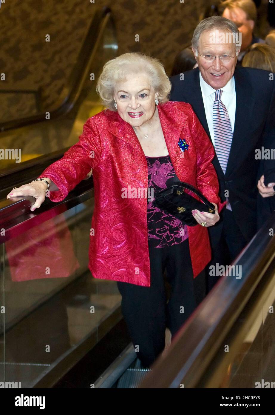 Kansas City, USA. 20th Jan, 2011. Actress Betty White arrives at Crown Center in Kansas City, Missouri, on Thursday, January 20, with Brad Moore, president of Hallmark Hall of Fame Productions, to watch the Hallmark Hall of Fame screening of her upcoming dramatic role in 'The Lost Valentine.' The screening coincided with a surprise birthday party for White. (Photo by Allison Long/Kansas City Star/MCT/Sipa USA) Credit: Sipa USA/Alamy Live News Stock Photo