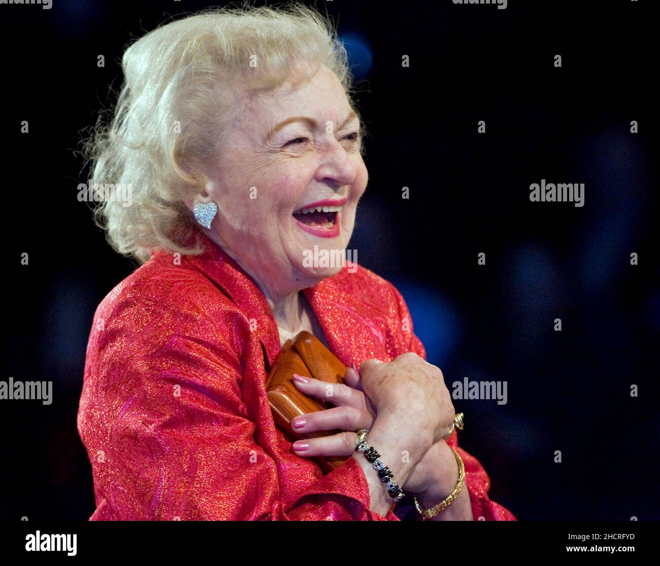Kansas City, USA. 20th Jan, 2011. Actress Betty White reacts to the Hallmark Gospel Choir, as they sing for her birthday at Crown Center in Kansas City, Missouri, on Thursday, January 20, 2011. Brad Moore, president of Hallmark Hall of Fame Productions, surprised White with a birthday celebration after the screening of her upcoming Hallmark Hall of Fame movie 'The Lost Valentine.' (Allison Long/Kansas City Star/MCT/Sipa USA) Credit: Sipa USA/Alamy Live News Stock Photo