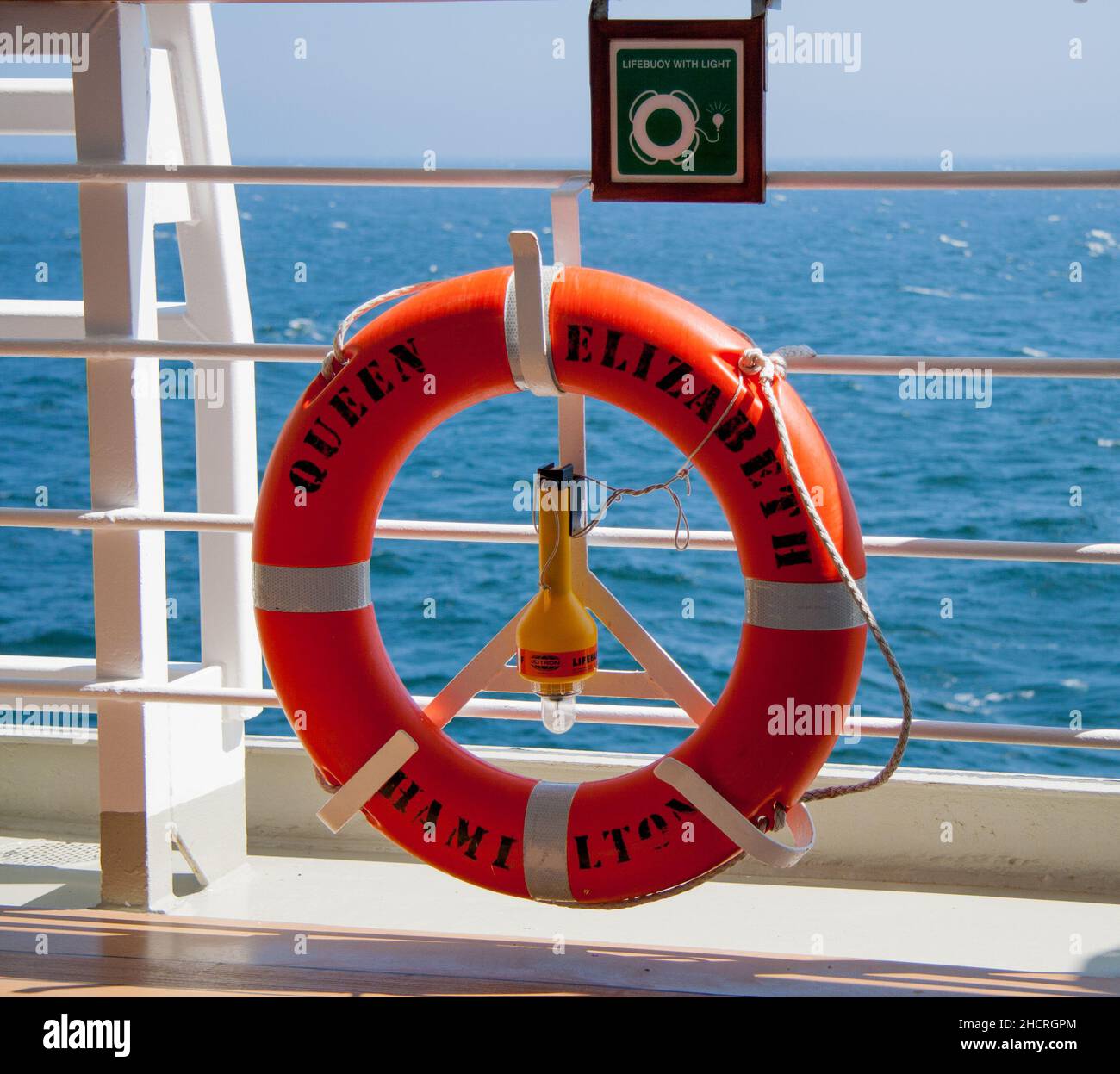 Life ring or life preserver on the promenade deck of the Cunard luxury
