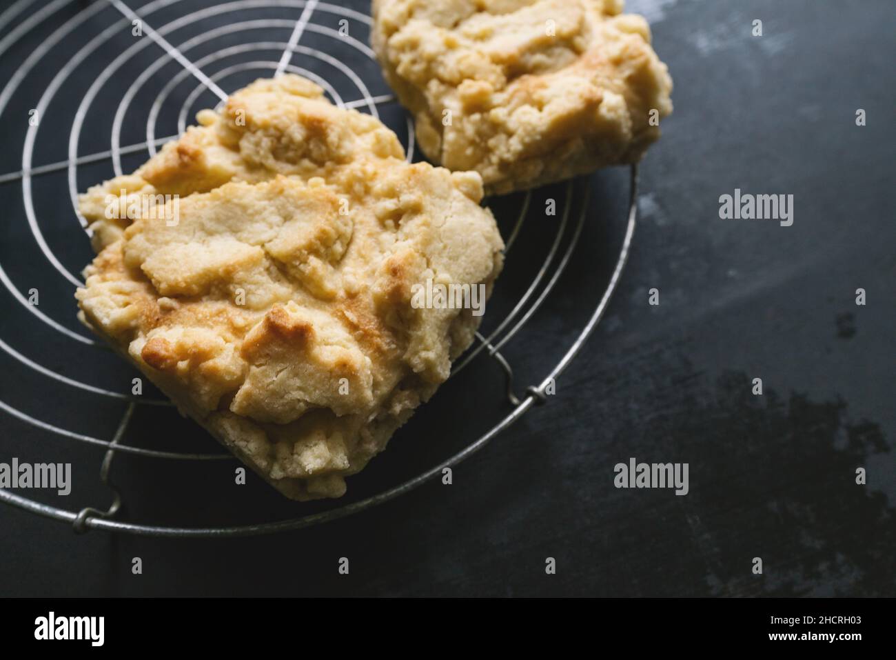 streusel buns or rolls on old table bakery grid Stock Photo