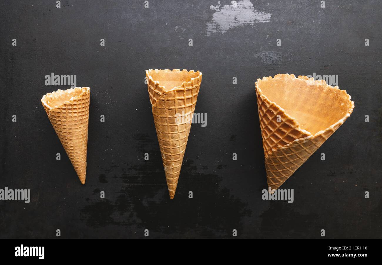 Collection of empty ice cream cone on a table Stock Photo Alamy