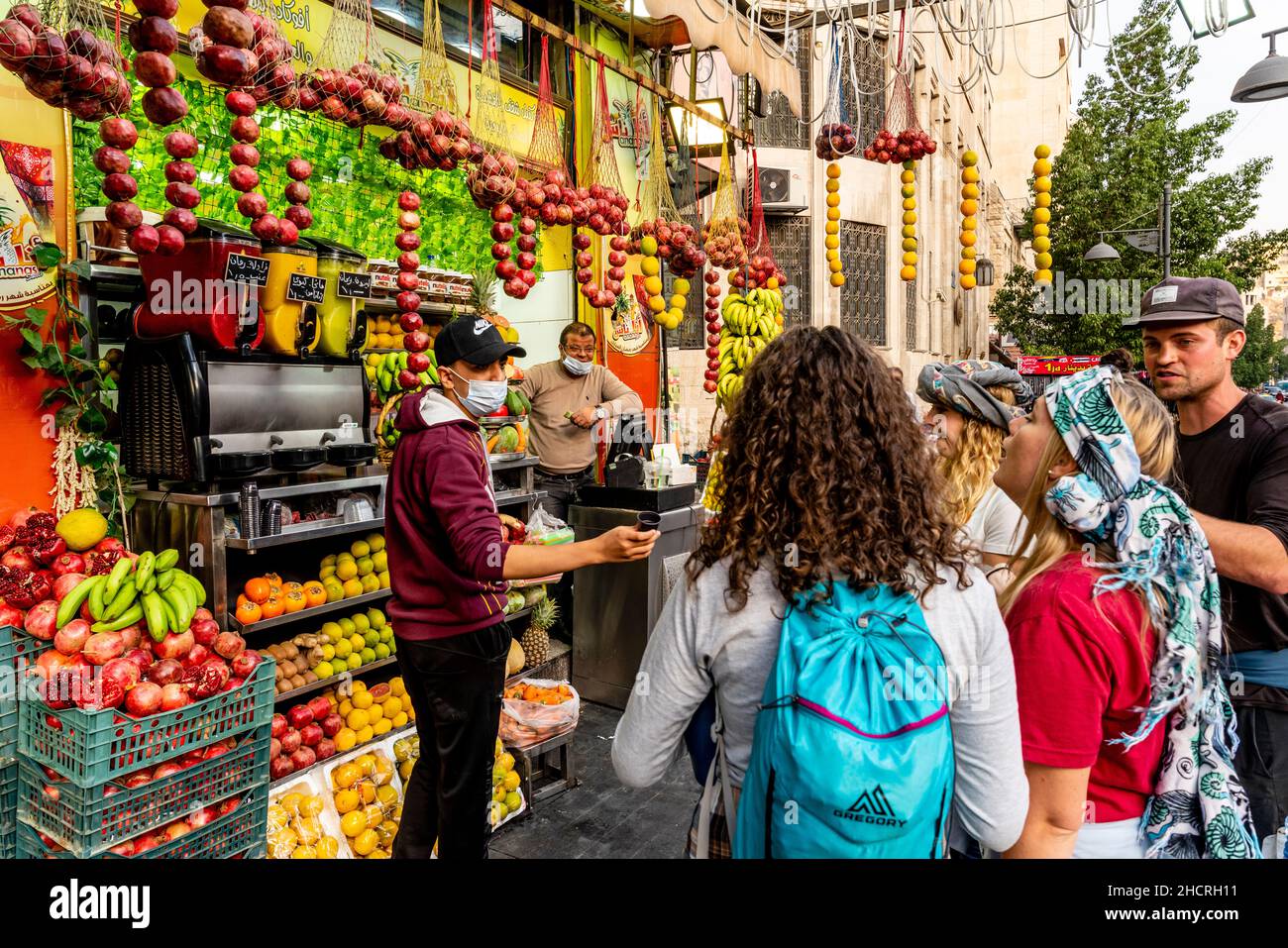 Visitors/Tourists Drinking Fresh Juice From A Juice Stall In Downtown  Amman, Amman, Jordan Stock Photo - Alamy