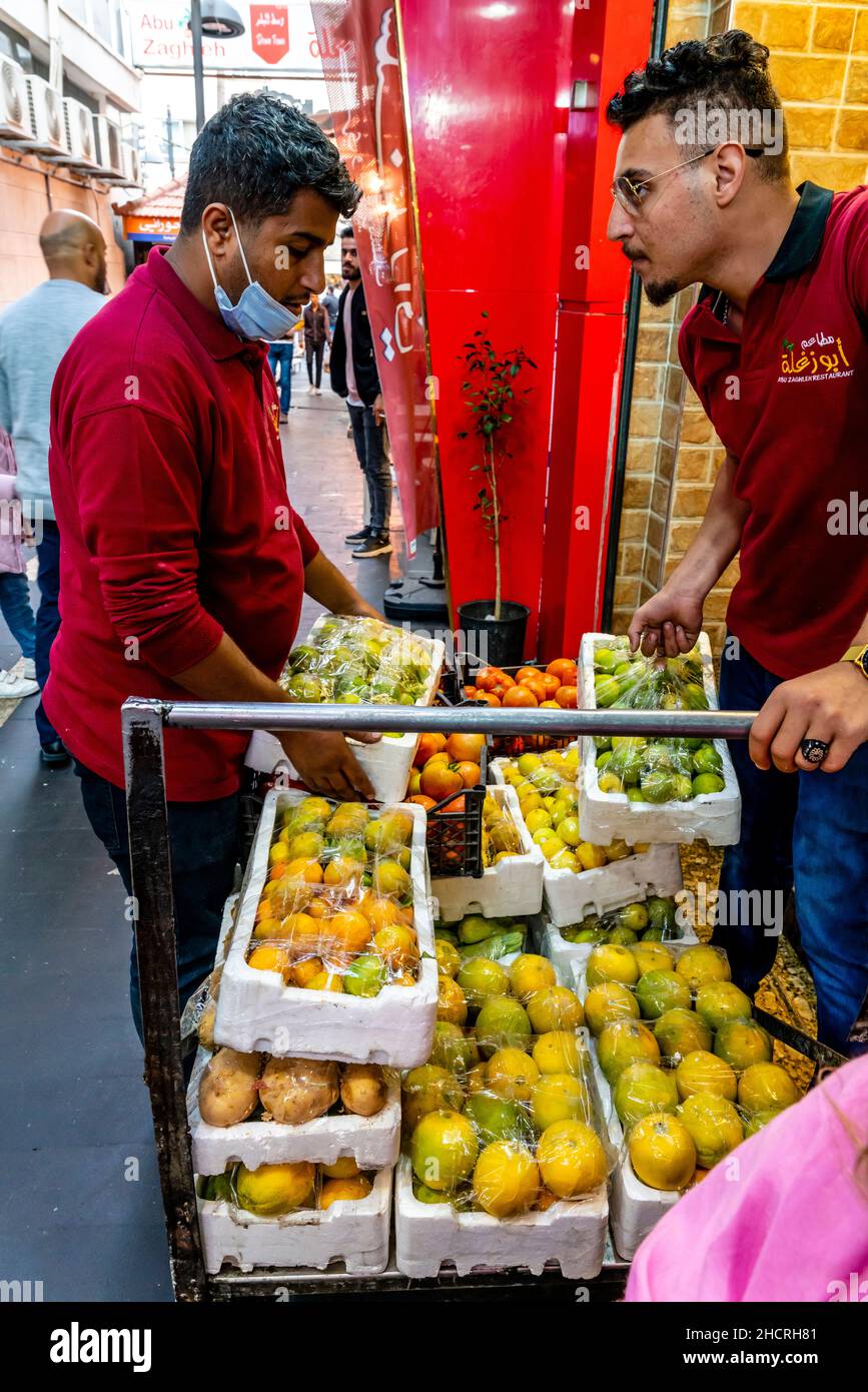 Two Young Men Delivering Fruit To A Restaurant In Downtown Amman, Amman