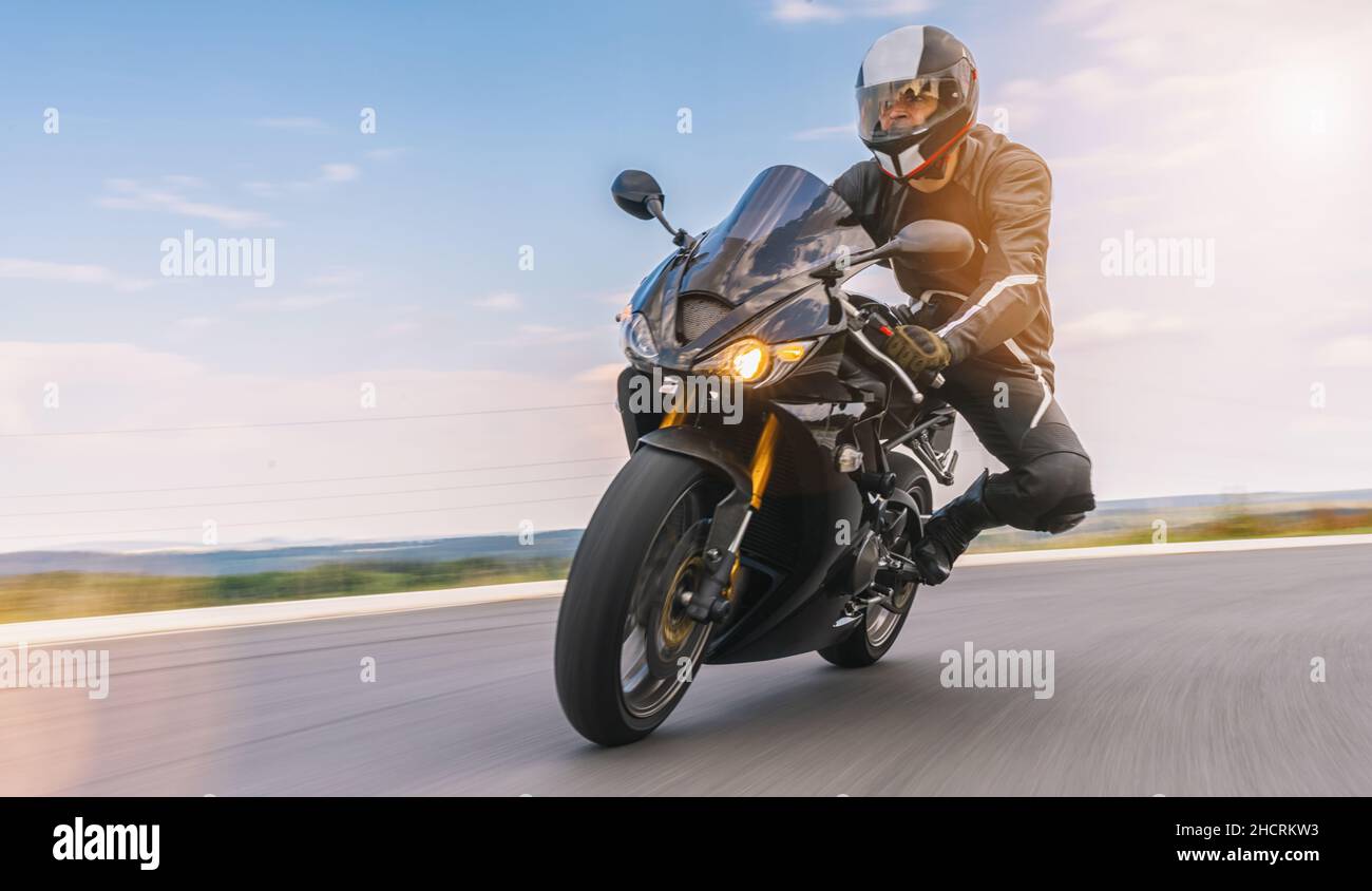 motorbike riding on road in a