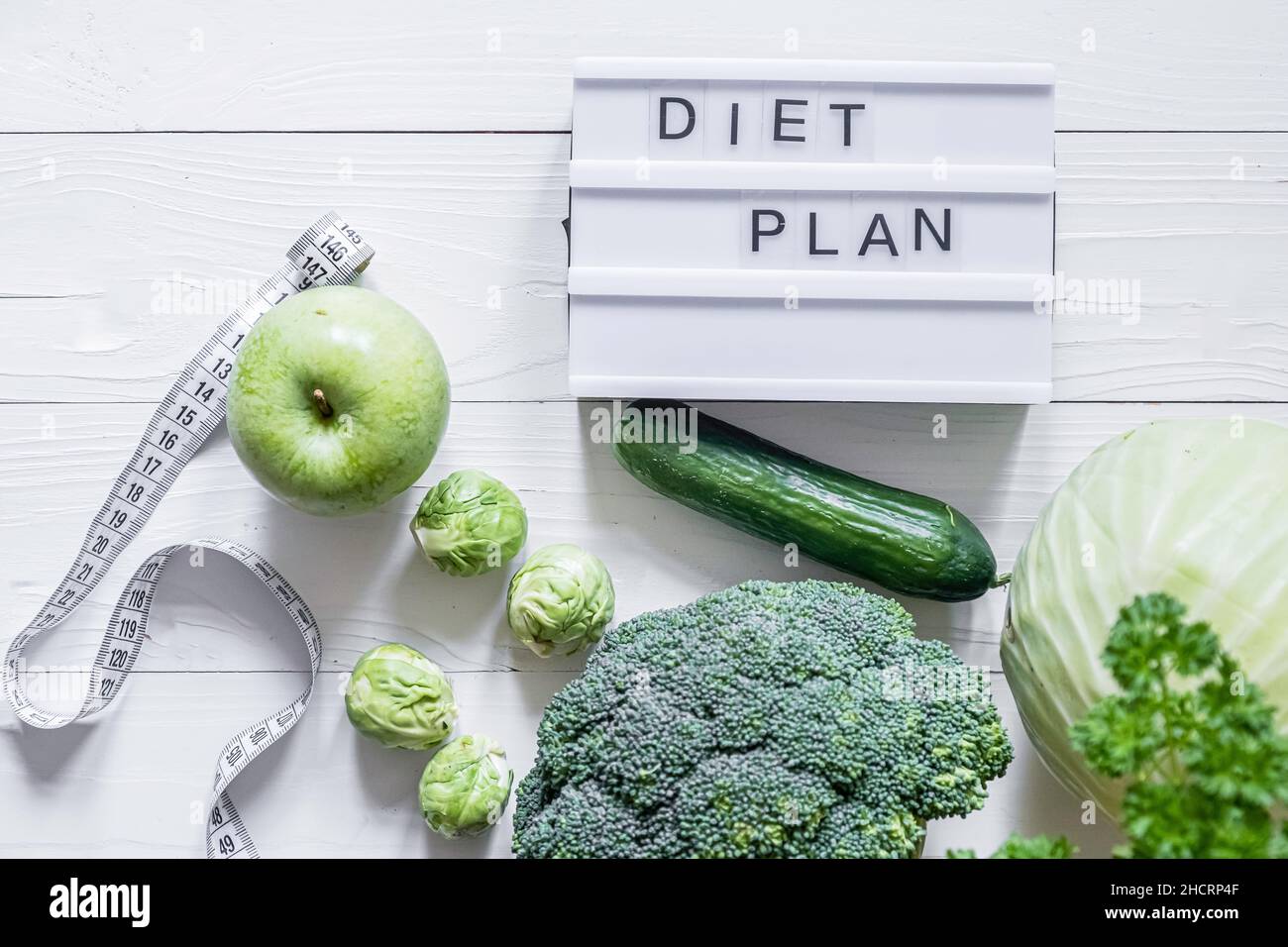 Concept diet and slimming plan with vegetables top view  Stock Photo