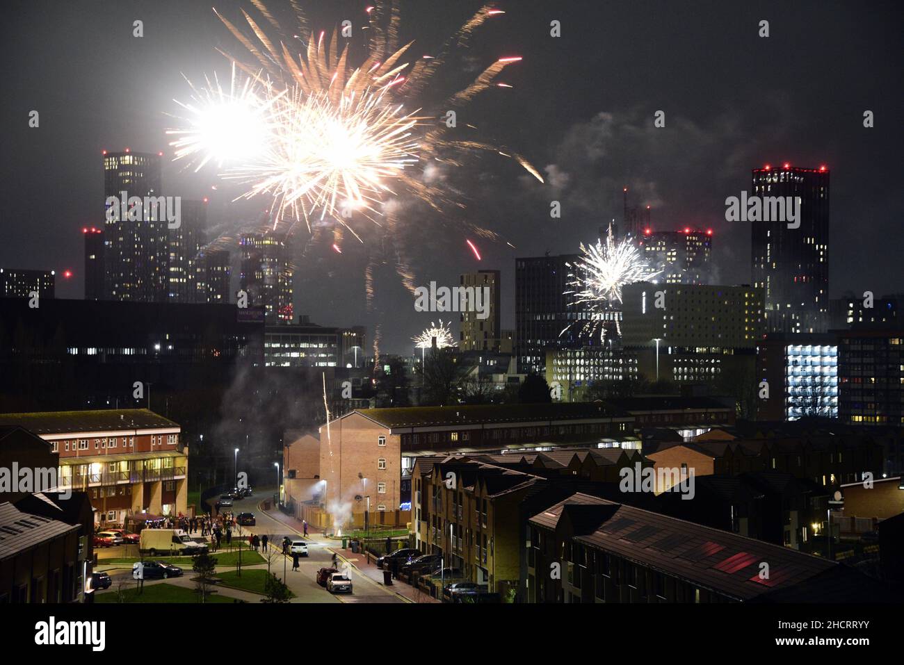 Fireworks in Manchester, England, United Kingdom, British Isles, at midnight to welcome the New Year 2022. Stock Photo