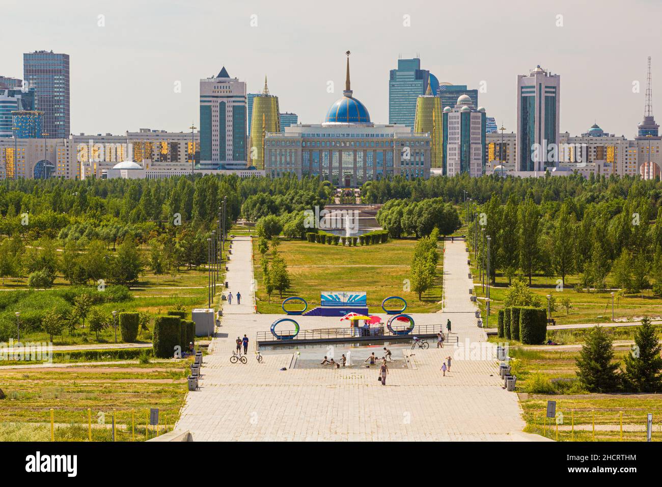ASTANA, KAZAKHSTAN - JULY 9, 2018: Government buildings behind the Presidential Park in Astana now Nur-Sultan , capital of Kazakhstan. Stock Photo