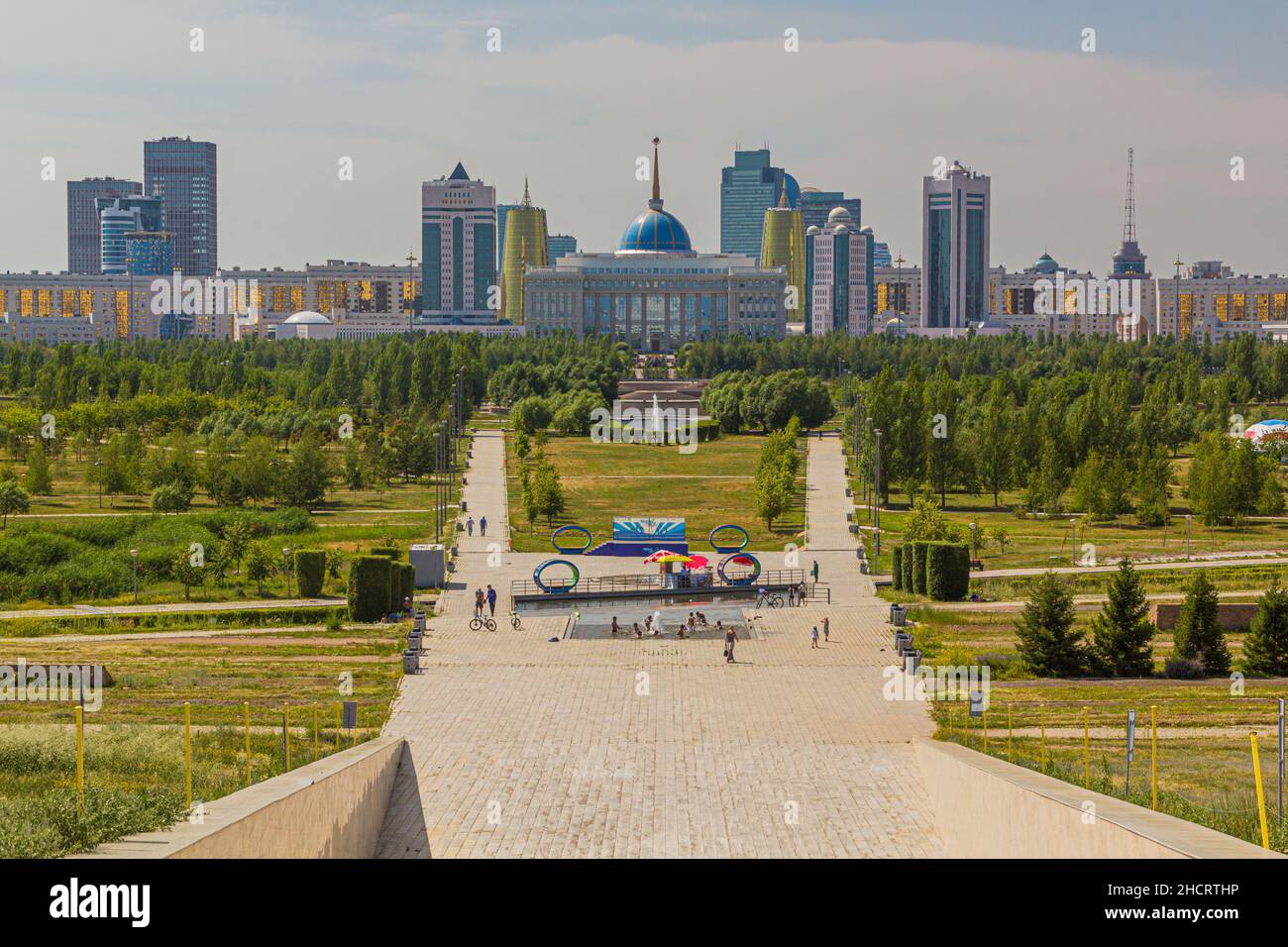ASTANA, KAZAKHSTAN - JULY 9, 2018: Government buildings behind the Presidential Park in Astana now Nur-Sultan , capital of Kazakhstan. Stock Photo
