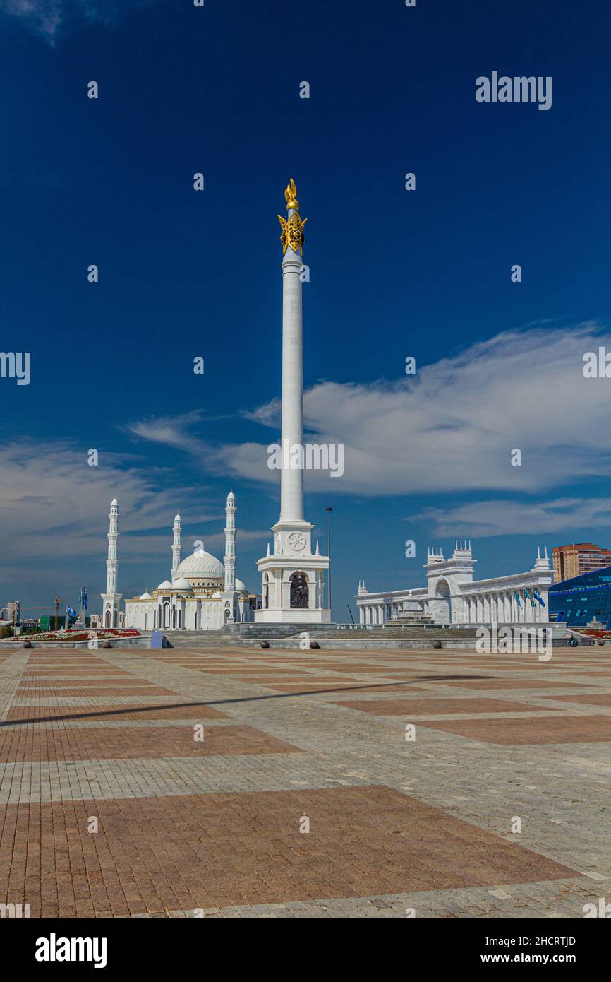 Hazrat Sultan Mosque and Kazakh Eli Monument on the Independence Square in Astana now Nur-Sultan , capital of Kazakhstan. Stock Photo