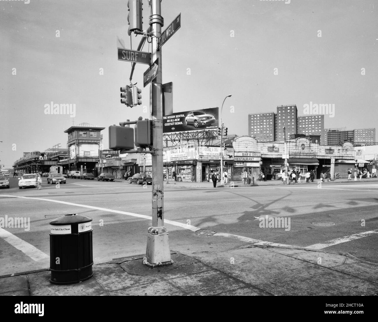 View of station in context, from the original Nathan's hotdog stand on the corner of Stillwell Avenue and Surf Avenue. Looking northeast. - Stillwell Avenue Station, Intersection of Stillwell & Surf Avenues, Brooklyn, Kings County, NY Stock Photo