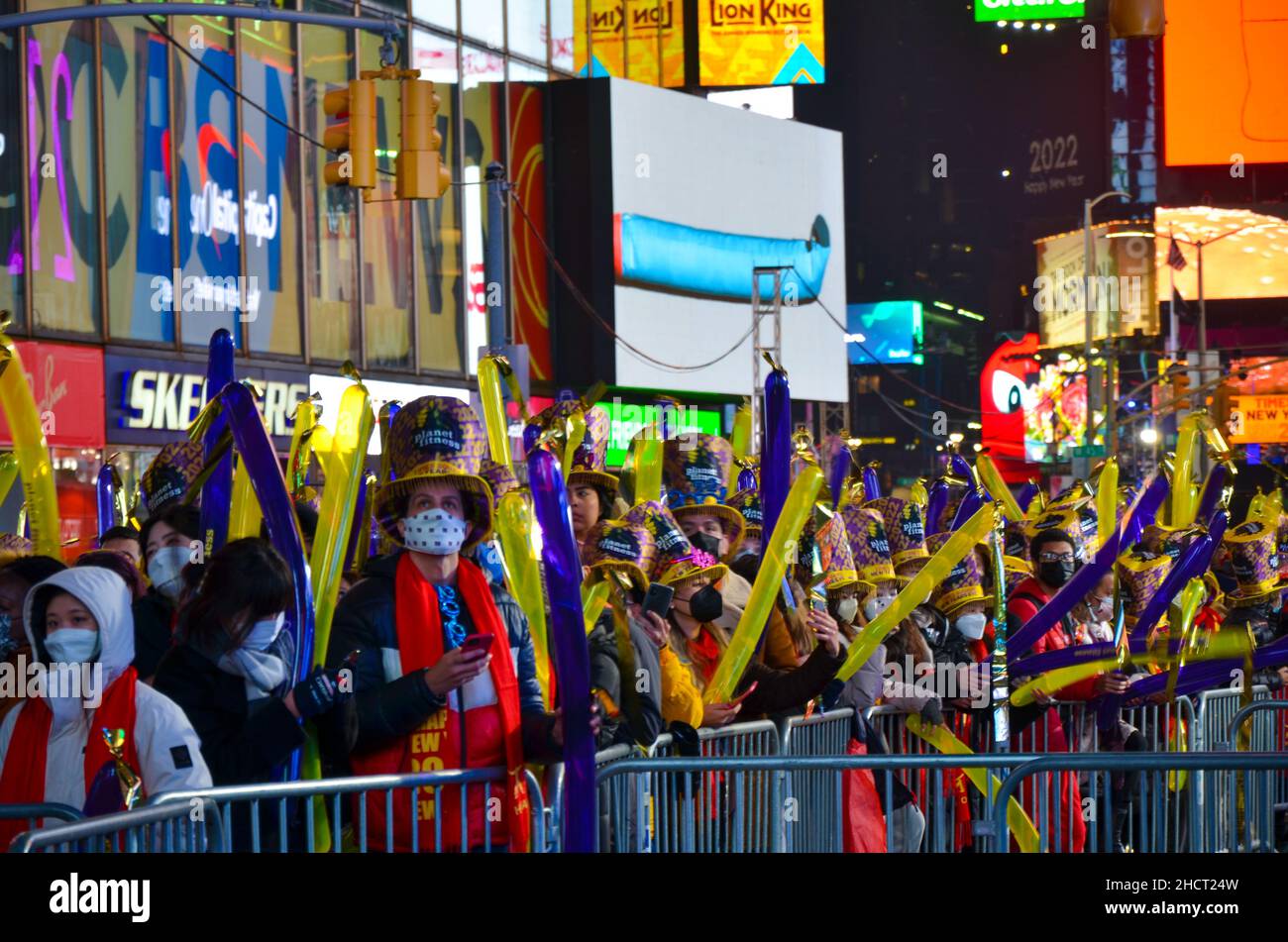 Thousands of revelers gather in New York's Times Square to celebrate the ball drop at the annual New Year's Eve celebration on December 31, 2021. Stock Photo