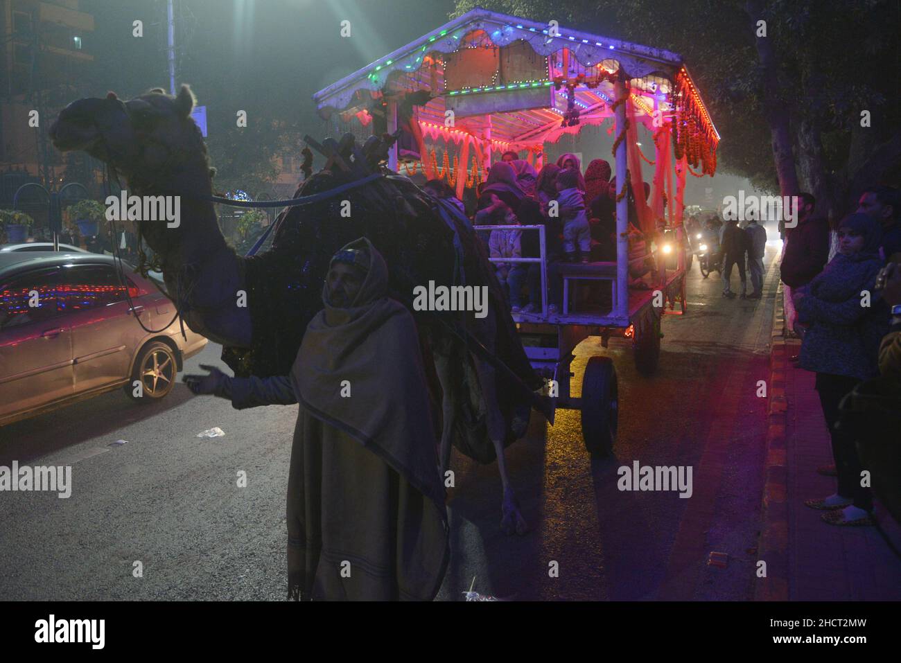 Lahore, Punjab, Pakistan. 1st Jan, 2022. Pakistani youngsters celebrate New Year's eve on mall road in Lahore. (Credit Image: © Rana Sajid Hussain/Pacific Press via ZUMA Press Wire) Credit: ZUMA Press, Inc./Alamy Live News Stock Photo
